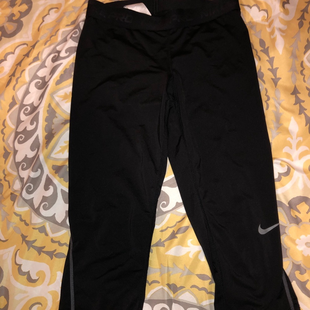 Black Nike athletic pants